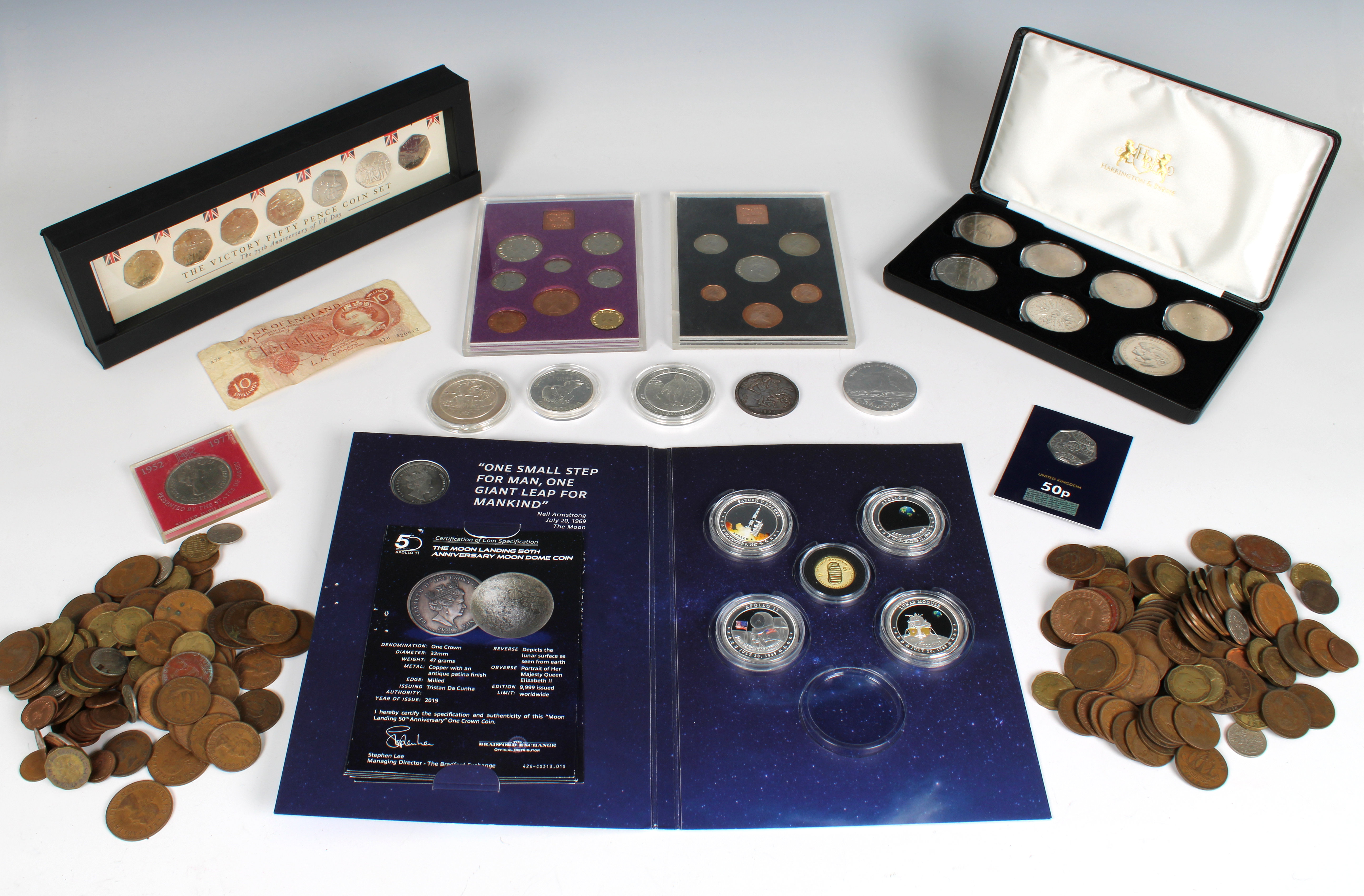 A collection of various vintage and commemorative coinage