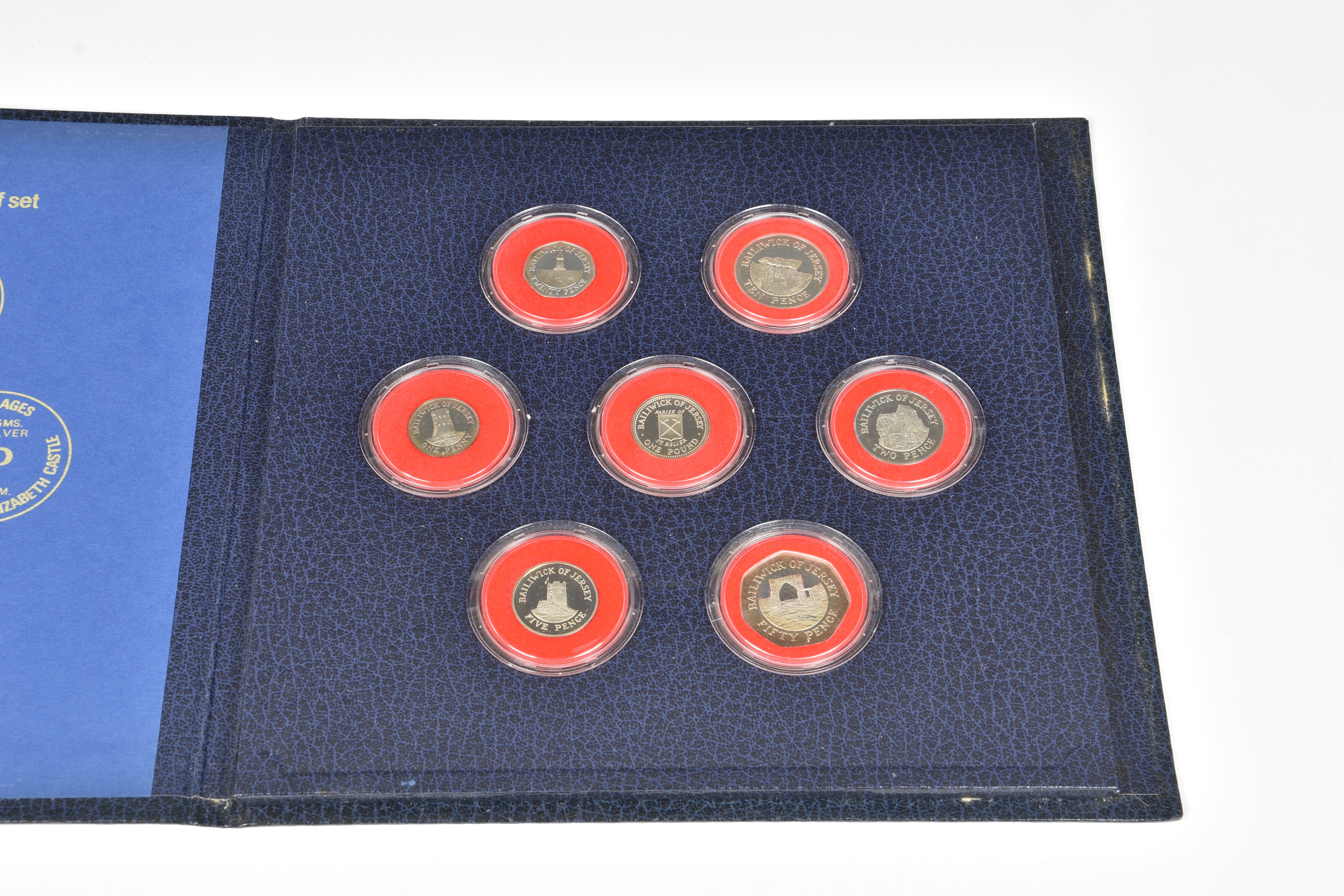 Two States of Jersey seven-coin silver frosted proof sets