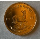 A South Africa 1974 Full 1oz fine gold Krugerrand coin.