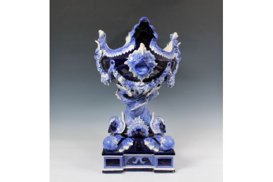 An impressive ceramic blue glazed jardiniere of navette form, having dolphin head lugs and - Image 2 of 4