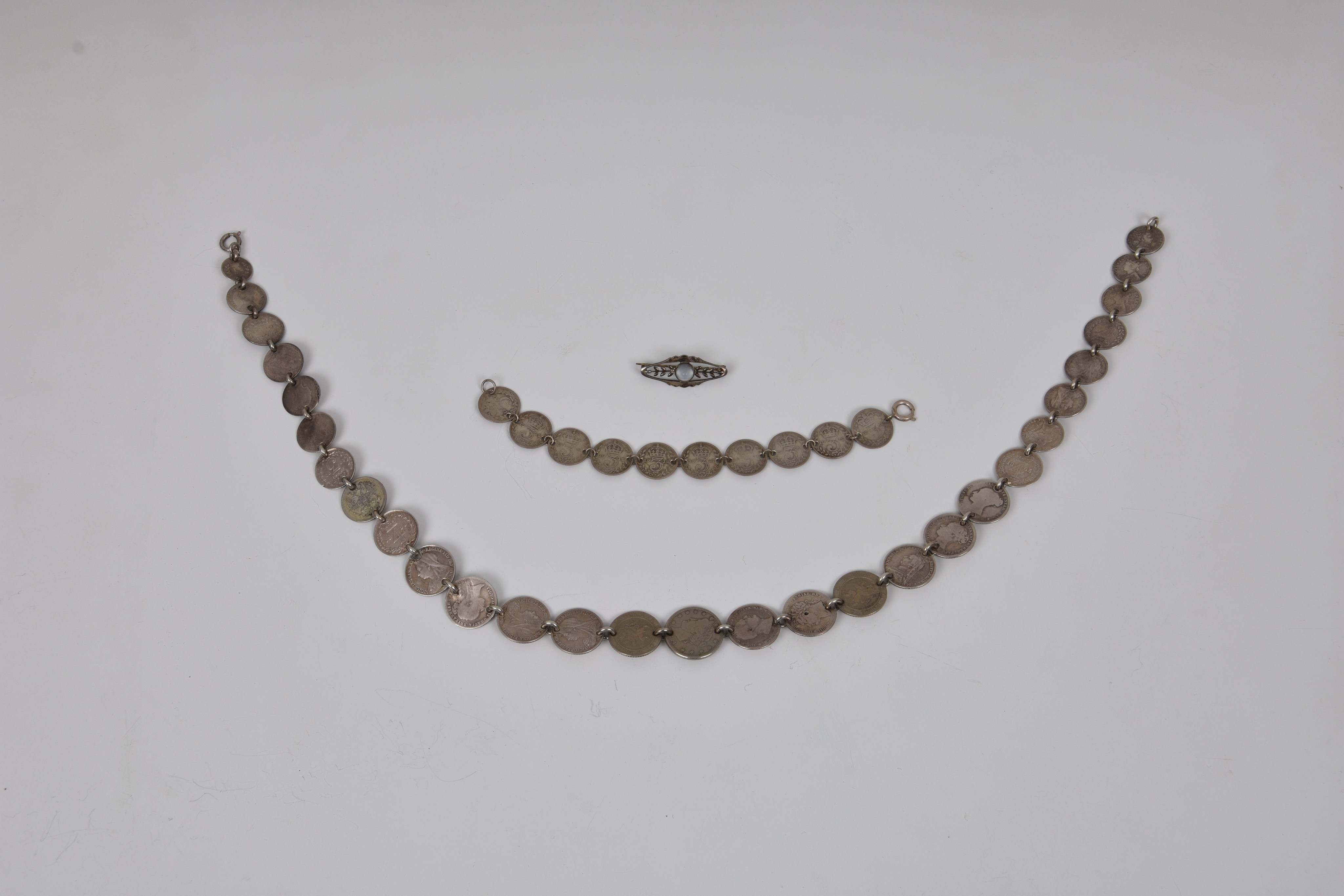 A silver coin necklace and braceletthe necklace made up of twenty nine various graduated silver - Image 2 of 2