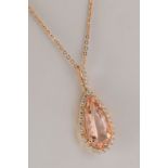 An 18ct rose gold morganite and diamond pendantthe pear shaped morganite approximately 4.79cts,