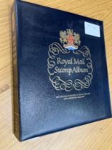 Royal Mail hingeless album with pages for 1992 to 2002 GB stamps