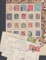 STAMPS Small batch of early JAPAN stamps and postcards