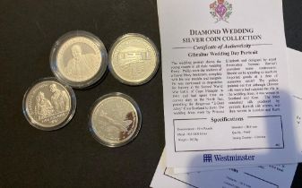 Four Silver Commemorative Crowns, each in Sterling silver and 28.28g each