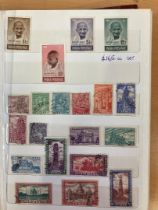 Small stockbook of mint and used including better stamps such as Ghandi 10r mint and used