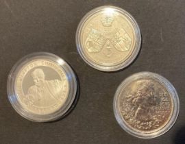 Three Silver Proof £5 coins, minor blemishes notes