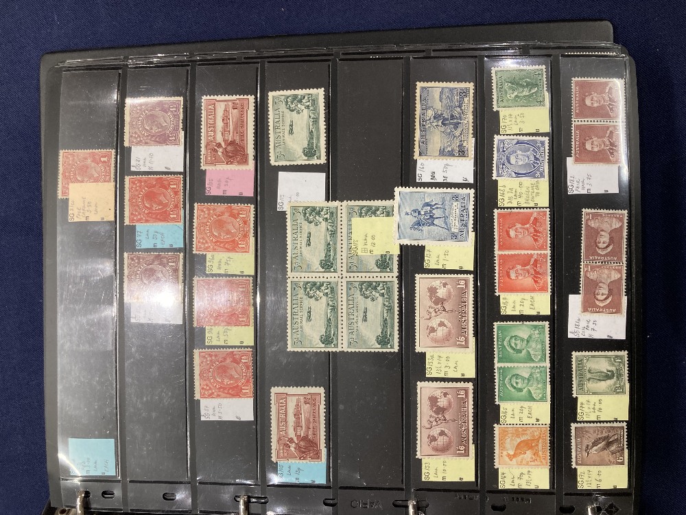 STAMPS Mint and used ex dealers stock, well filled display book with better spotted