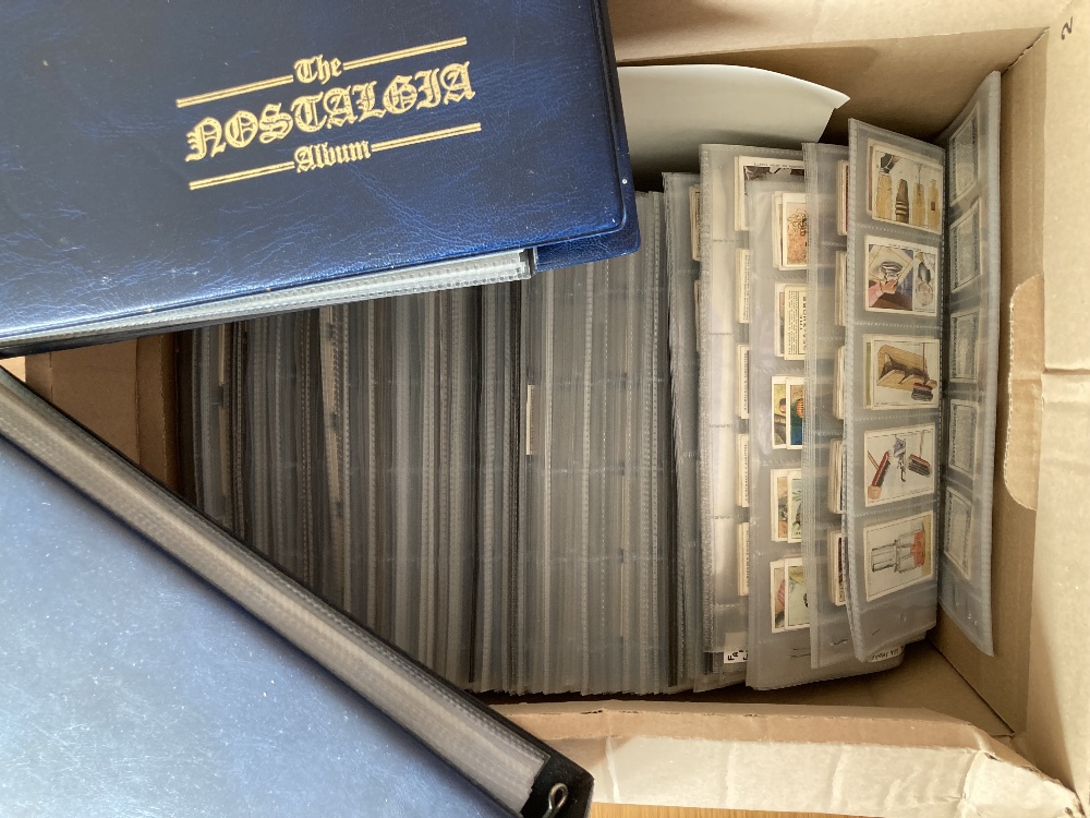 Box with 117 sets all neatly displayed in cigarette card pages