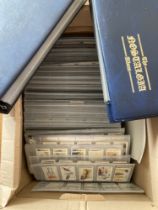 Box with 117 sets all neatly displayed in cigarette card pages