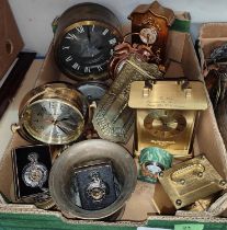 A collection of brass metalware:  mortar; clocks; etc.
