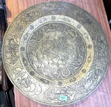 A large heavy Chinese bronze charger decorated with warriors etc 61cm diameter