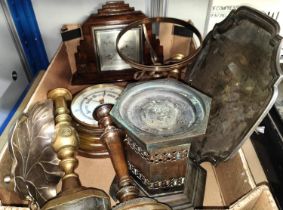 A large bronze candle stand, tow aneroid barometers, silver plate and brassware