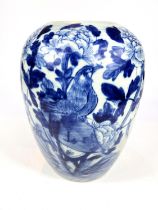 A Chinese glazed vase with blue decoration of birds on floral branch, a partial seal mark on