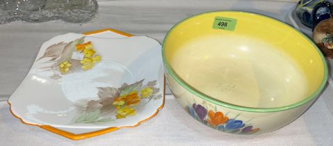 A circular fruit bowl by Wilkinson's decorated with crocus in the Clarice Cliff manner; a 1930's