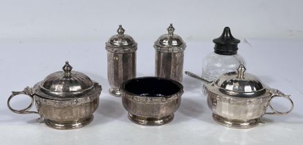 A hallmarked silver 5 piece circular cruet set, Birmingham 1935