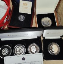 SOLOMON ISLANDS - $1, $ & $5 set fine silver,  an IOM silver proof £1, a £5 Britannia 2009 and