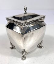 A Georgian style silver Bombay sugar caddy with gadrooned lid, lions paw feet, Birmingham 1907 5.4oz