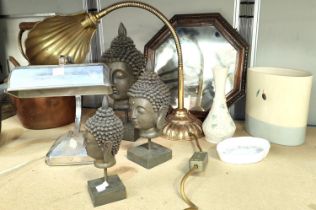 A Chrome vintage desk lamp, a brass shell lamp and graduating modern buddha heads