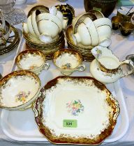 A Hammersley part tea set with red and gilt border and polychrome floral bouquets, 33 pieces approx.