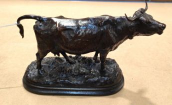 I. BONHEUR, a 19th century French animalier bronze of a dairy cow, signed, 24cm length