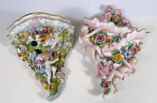 A late Meissen/Dresden wall vase, encrusted cornucopia with cherub, height 32cm; a similar wall