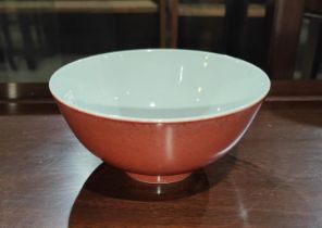 A Chinese oxblood glazed bowl with seal mark to base, diameter 14.5cm