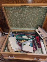 A large light oak collectors box set up for pens and contents, pens and pencils