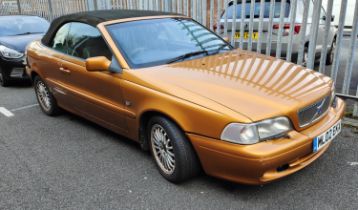 A VOLVO C70 AUTO 2 door convertible motorcar, 1984cc petrol engine, orange coachwork, REG NO ML02