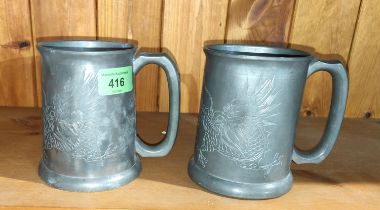 Two Chinese Export pewter tankards, stamped Tehyee, bothe with glass bases (one cracked) etched with