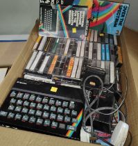 A 1970's/80's Sinclair "Spectrum 7X" 48K personal computer with games, programming books etc