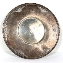 A hallmarked silver circular bottle stand with wide pierced border, Sheffield 1918, diameter 24cm,
