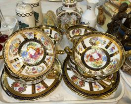 A Paragon set of 6 soup bowls and stands decorated in gilt, blue and polychrome; Coalport cottage