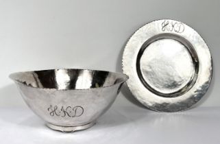 A hall marked silver arts and crafts planished bowl and dish stand with monogram to bowl and dish