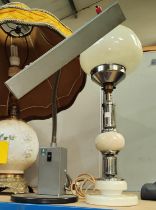 An unusual mid 20th century lamp with chrome and cream fittings with mushroom glass shade; a