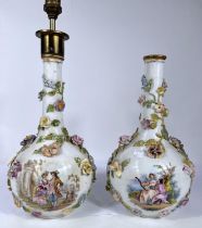 A pair of 19th century Meissen/Dresden bottle vases with spherical bodies and long slender necks,