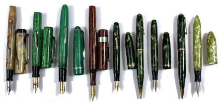 A collection of various fountain pens, and other pens