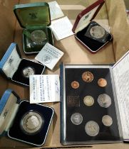 A selection of GB cased proof coins: 1985 proof set, 1981 silver proof crown, 1985 silver proof