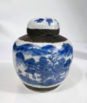 A Chinese crackle glaze ginger jar, blue and white with bark effect rim and foot, ht. 13cm