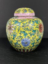 A late 19th/early 20th century Chinese famille jaune and polychrome ginger jar with scrolling floral