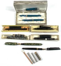 A collection of cased fountain pens, and other pens
