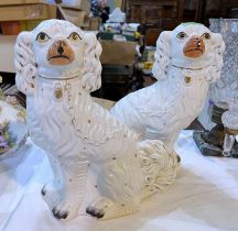 A 19th century pair of Staffordshire King Charles spaniels, height 33cm