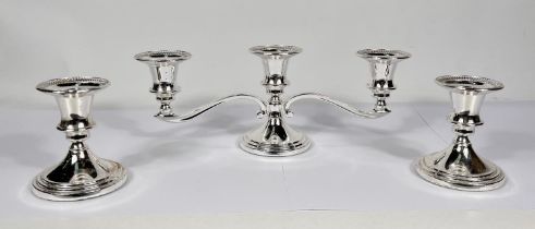 A canteen  of EPNS  beaded cutlery by Inkerman; a pair of brass candlesticks; a pestle & mortar;