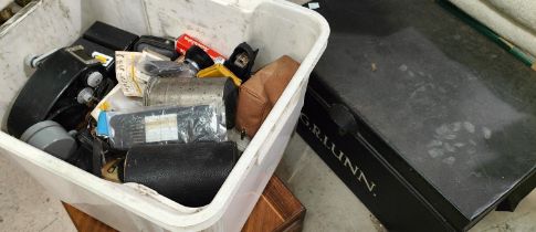 A small lock box tin and a selection of vintage camera equipment