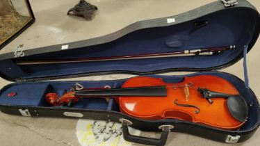 A 20th century students violin in hard case with bow, full size
