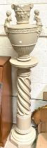 A large painted plaster twist column with matching vase (foot a.f) in the Greek manner