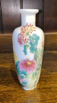 A Chinese Liuyeping vase decorated in polychrome of lush floral scene with inscriptions to reverse