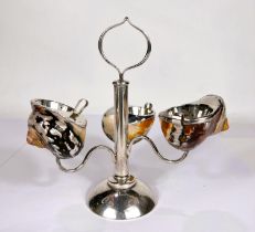 An unusual silver cruet on stand with polished sea shells fitted with silver interior fitted spoons,