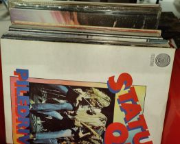 A collection of rock and other LP's including Status Quo, Emerson Lake and Palmer etc