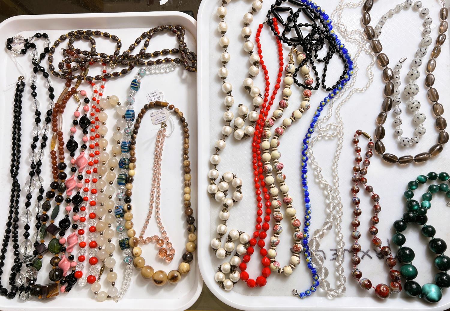 A selection of approx. 20 sets vintage bead necklaces including polished stones, crystal etc